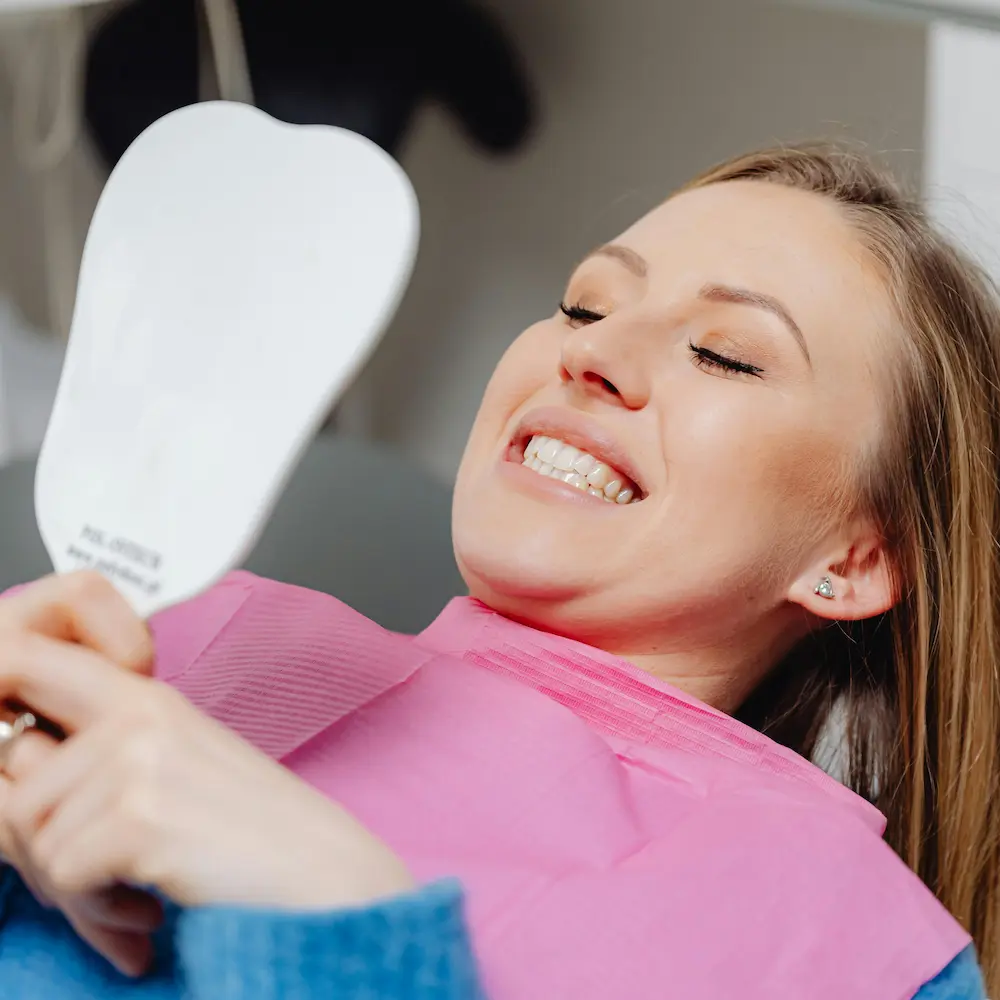 Smiling woman at dental office